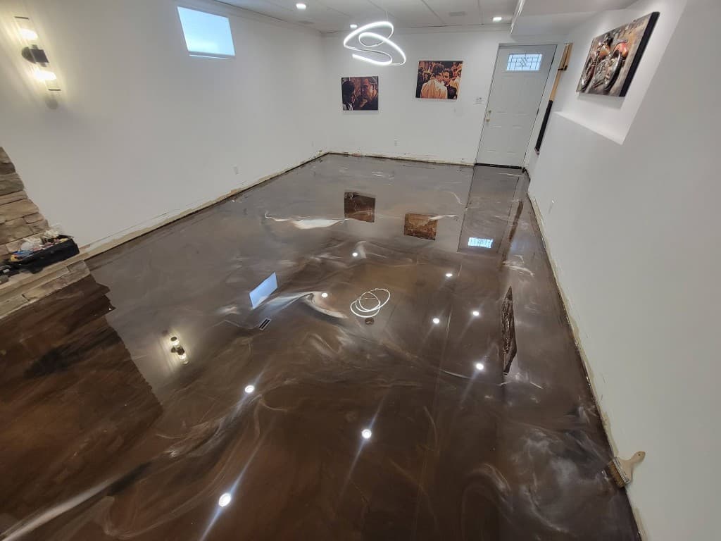 Finished basement with high-gloss metallic brown swirl epoxy floor